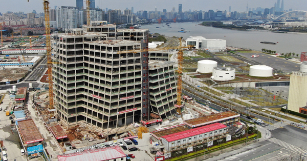 Building complex designed by Kazuyo Sejima capped