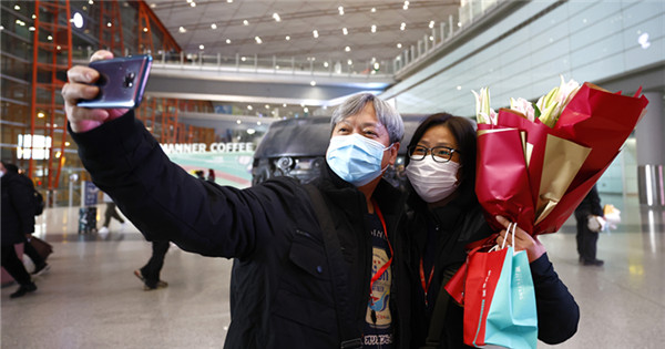 17 travelers from Hong Kong arrive in Beijing on first tour group