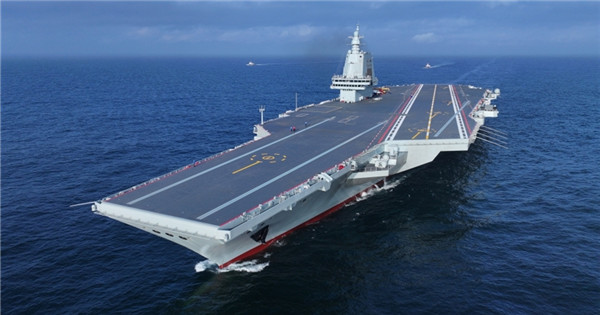 China's third aircraft carrier completes maiden sea trial