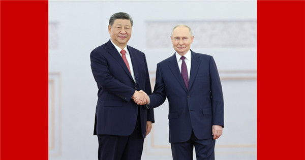 Xi holds talks with Putin
