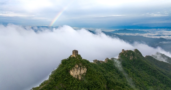 Rainbow appears in sky above Simatai Great Wall in Beijing after rainfall