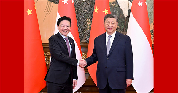 Xi meets Singaporean PM