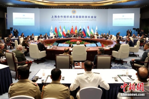 Defense Minister Dong Jun (center) chairs and addresses the Shanghai Cooperation Organization Defense Ministers' Meeting in Qingdao, Shandong province, on Thursday. (Photo/China News Service) Defense Minister Dong Jun (center) chairs and addresses the Shanghai Cooperation Organization Defense Ministers' Meeting in Qingdao, Shandong province, on Thursday. (Photo/China News Service)