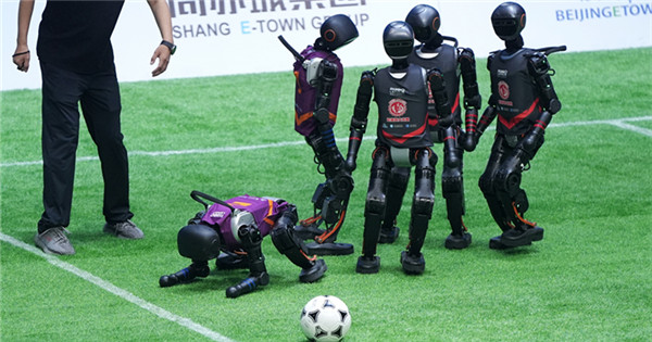 China launches first 3v3 AI robot football match