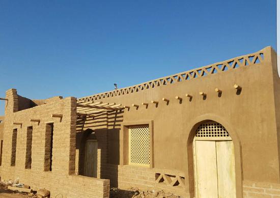 A homestay property with local characteristics is under construction in Tuyoq. /File photo via Xinjiang's regional Poverty Alleviation and Development Office