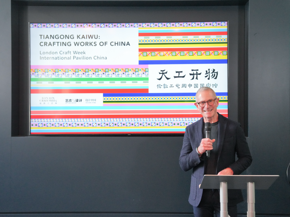 Guy Salter, chairman and founder of London Craft Week, speaks at the opening ceremony of the China Pavilion for the 2025 London Craft Week on May 12. (Photo provided to China Daily)