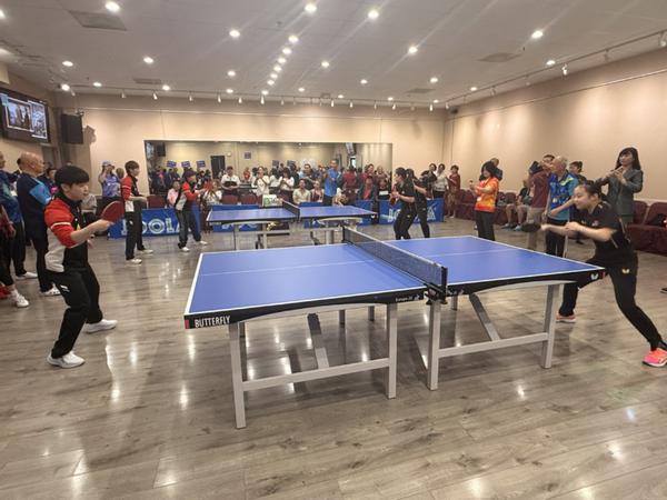 Chinese table tennis athlete Sun Yingsha (left) plays against a US athlete at a friendship match on Sunday in Las Vegas, Nevada to commemorate the 54th anniversary of "ping-pong diplomacy". LIA ZHU / CHINA DAILY