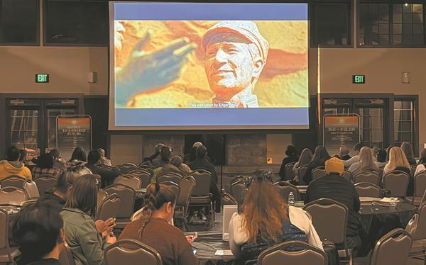 People watch the documentary Bridge to a Shared Future, which traces the legacy in China of journalists Edgar Snow and Helen Foster Snow, who were from the United States, on Saturday in Salt Lake City, Utah, the US. LIA ZHU/CHINA DAILY