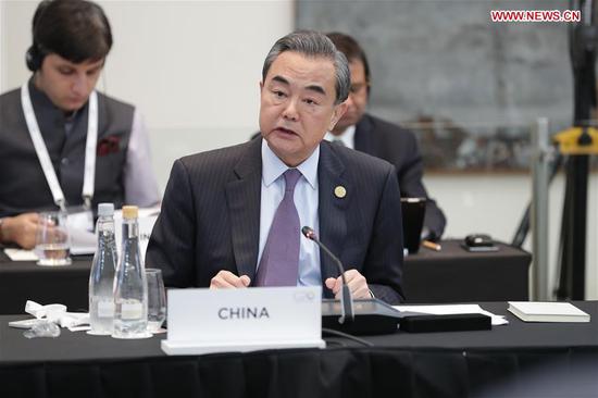Chinese State Councilor and Foreign Minister Wang Yi addresses the G20 foreign ministers' meeting in Buenos Aires, Argentina, May 21, 2018. (Xinhua/Martin Zabala)