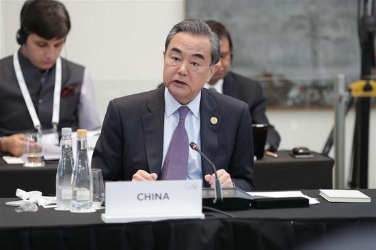 Chinese State Councilor and Foreign Minister Wang Yi addresses the G20 foreign ministers' meeting in Buenos Aires, Argentina, May 21, 2018. (Xinhua/Martin Zabala)