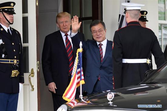 U.S. President Donald Trump (2nd L) welcomes visiting President of the Republic of Korea (ROK) Moon Jae-in (3rd L) at the White House in Washington D.C., the United States, on May 22, 2018. (Xinhua/Yang Chenglin)