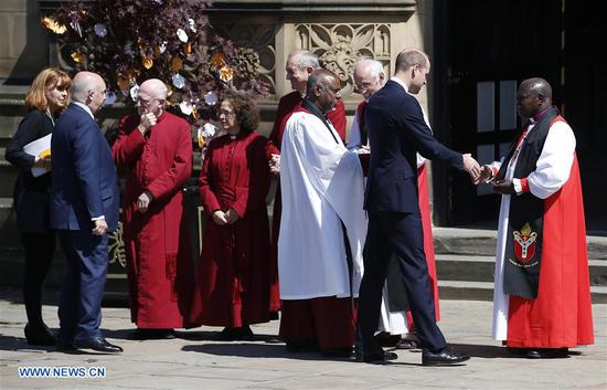 Prince William (2nd R) arrives at Manchester Cathedral during the national service of commemoration to remember the victims of the bomb attack in Manchester, Britain, on May 22, 2018.  (Xinhua/Craig Brough)