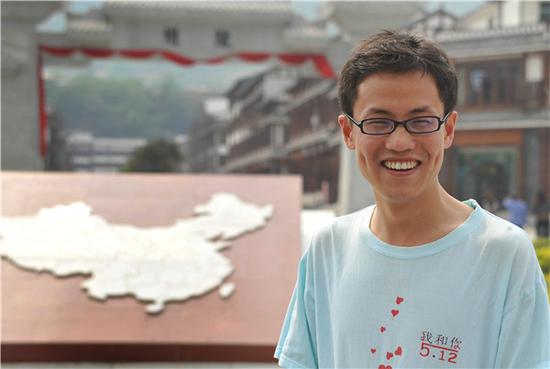 Qi Jianfeng visits Nanba, where he spent about three years as a volunteer. YAN JUN/FOR CHINA DAILY