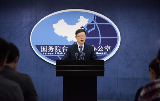 An Fengshan, spokesman for the Taiwan Affairs Office of the State Council, answers questions at a press conference in Beijing on March 28, 2018.  (Photo/Xinhua)