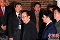 Ex-S Korean President Lee Myung-bak appears at first trial over corruption charges