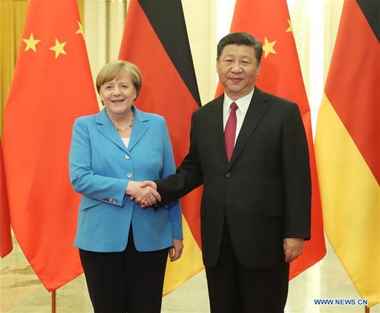Chinese President Xi Jinping meets with German Chancellor Angela Merkel, in Beijing, capital of China, May 24, 2018. (Xinhua/Liu Weibing)