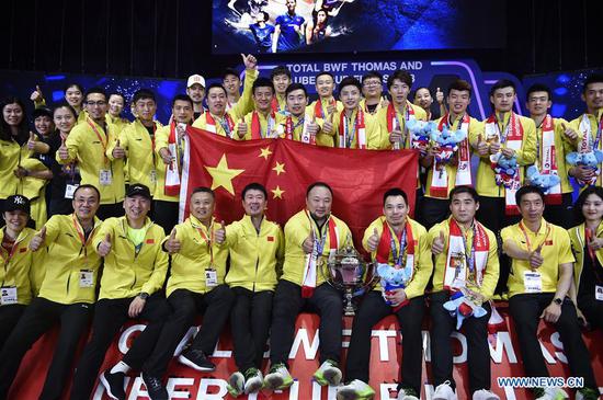 Team China celebrate during the medal presenting ceremony after winning the final against team Japan at the Thomas Cup badminton tournament in Bangkok, Thailand, on May 27, 2018. Team China won the final 3-1 and claimed the title of the event. (Xinhua/Wang Shen)