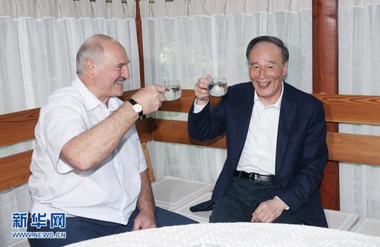 Chinese Vice President Wang Qishan meets with Belarusian President Alexander Lukashenko on Monday May 28, 2018. [Photo: Xinhua]