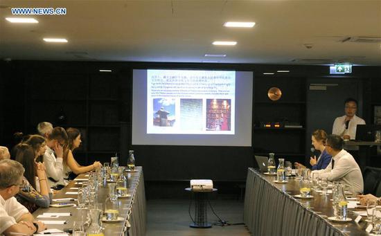 Chinese Tibetologists hold a meeting with Latvian representatives in Riga, Latvia, May 28, 2018. (Xinhua/Janis)