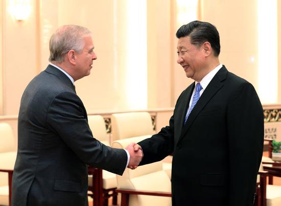 President Xi Jinping meets Britain's Prince Andrew, the Duke of York, at the Great Hall of the People in Beijing on Tuesday. Xi expressed his appreciation for the prince's efforts to further advance China-UK relations. (Photo/CHINA DAILY)