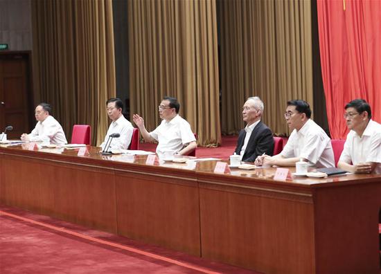 Chinese Premier Li Keqiang (3rd L) delivers a report on economic and social development during the 19th Meeting of the Academicians of the Chinese Academy of Sciences (CAS) and the 14th Meeting of the Academicians of the Chinese Academy of Engineering (CAE) in Beijing, capital of China, May 29, 2018. (Photo/Xinhua)