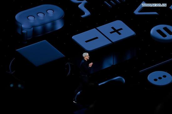 Apple CEO Tim Cook takes the stage during Apple's Worldwide Developer Conference (WWDC) at the San Jose Convention Center in San Jose, California, the United States, June 4, 2018. (Xinhua)