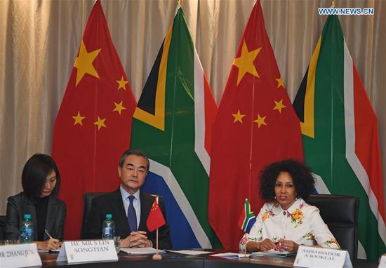 Chinese State Councilor and Foreign Minister Wang Yi (C) meets with South African Minister of International Relations and Cooperation Lindiwe Sisulu (R) in Pretoria, South Africa, on June 4, 2018. (Xinhua/Chen Cheng)