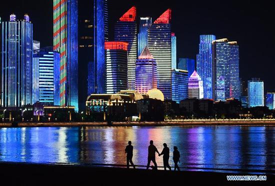 Photo taken on May 3, 2018 shows the night view of Fushan Bay in Qingdao, east China's Shandong Province. The 18th Shanghai Cooperation Organization (SCO) Summit is scheduled for June 9 to 10 in Qingdao. (Xinhua/Li Ziheng)