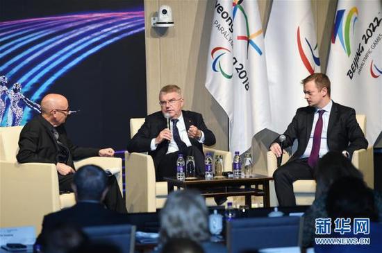 International Olympic Committee (IOC) President Thomas Bach (Middle) speaks at the closing ceremony of an official debriefing of the PyeongChang 2018 Olympic and Paralympic Winter Games in Beijing, June 5, 2018. [Photo: Xinhua]