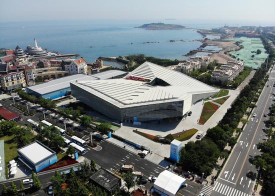 Aerial photo shows the media center of the 18th Shanghai Cooperation Organization (SCO) Summit in Qingdao, East China's Shandong Province, June 3, 2018. (Photo/Xinhua)