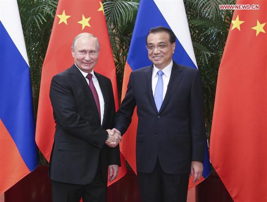 Chinese Premier Li Keqiang meets with Russian President Vladimir Putin in Beijing, capital of China, June 8, 2018. Putin arrived in Beijing on Friday for a state visit and the attendance of the Council of Heads of State of the Shanghai Cooperation Organization (SCO) scheduled for Saturday and Sunday in Qingdao, east China's Shandong Province. (Xinhua/Yao Dawei) 
