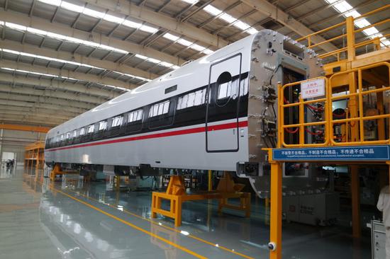 Manufacturing line at the CRRC Qingdao Sifang manufacturing base /CRI Photo