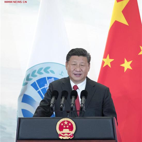 Chinese President Xi Jinping addresses a banquet held for guests attending the 18th Shanghai Cooperation Organization (SCO) summit in Qingdao, east China's Shandong Province, June 9, 2018. (Xinhua/Xie Huanchi)