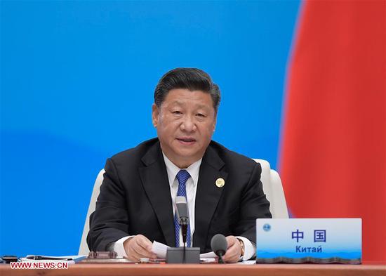 Chinese President Xi Jinping chairs the 18th Meeting of the Council of Heads of Member States of the Shanghai Cooperation Organization (SCO) in Qingdao, east China's Shandong Province, June 10, 2018. Xi delivered a speech during the meeting. (Xinhua/Li Xueren)
