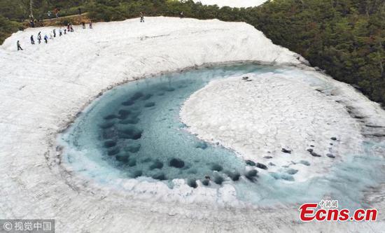 'Dragon eye' shaped pond seen on Japan mountain
