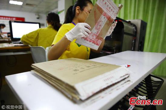 Gaokao test paper graded under tight security in Hainan