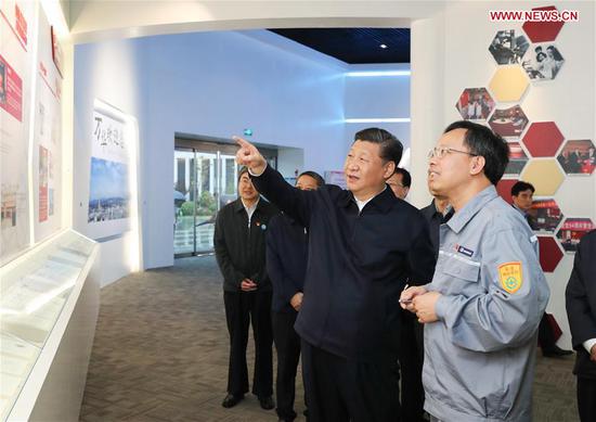 Chinese President Xi Jinping, also general secretary of the Communist Party of China Central Committee and chairman of the Central Military Commission, visits an industrial park of Wanhua Chemical during an inspection tour in Yantai, east China's Shandong Province, June 13, 2018. (Xinhua/Xie Huanchi)