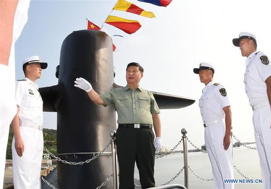 Chinese President Xi Jinping, also general secretary of the Communist Party of China Central Committee and chairman of the Central Military Commission, visits a submarine during an inspection to the navy under the Northern Theater Command of the Chinese People's Liberation Army, June 11, 2018. (Xinhua/Li Gang)