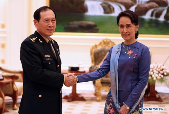 Myanmar State Counselor Aung San Suu Kyi (R) meets with visiting Chinese Defense Minister Wei Fenghe in Nay Pyi Taw June 15, 2018. (Xinhua/U Aung)