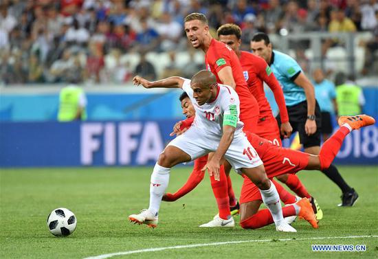 Late header from Kane gives England 2-1 win over Tunisia