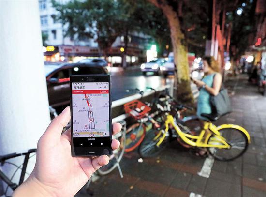 The Mobike app shows a prohibited parking area on Shimen Road No. 1.  (Photo/shine.cn)