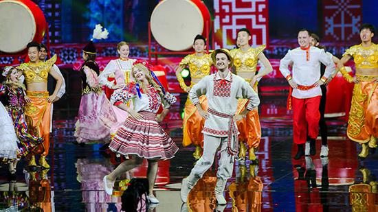 Singers and dancers from SCO nations perform at the closing ceremony. [Photo provided to China Daily]