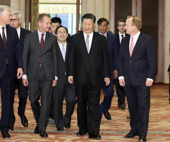 Xi meets executives of famous multinational companies
