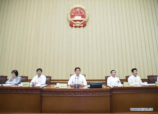 China's top legislature wraps up bimonthly session
