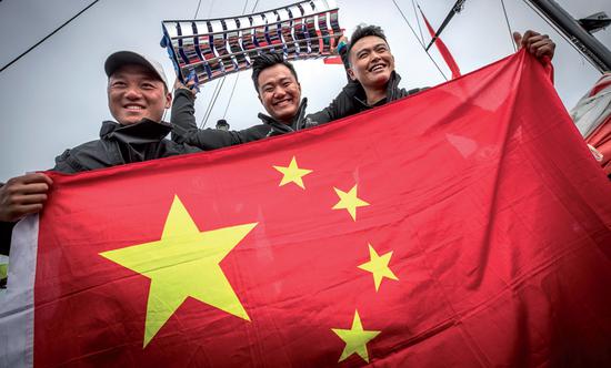 Chinese members of the Dongfeng crew celebrate their victory in The Hague on Sunday. (Photo provided to chinadaily.com.cn)