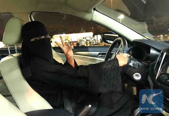 A Saudi Arabian woman is driving on the road in capital Riyadh on June 24, 2018. (Xinhua/Wang Bo)