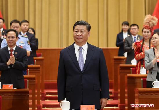 President Xi Jinping, also general secretary of the Communist Party of China (CPC) Central Committee and chairman of the Central Military Commission, attends the opening session of the 18th national congress of the Communist Youth League of China (CYLC) in Beijing, capital of China, June 26, 2018. (Photo/Xinhua)