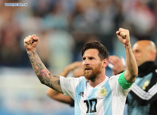 Lionel Messi of Argentina celebrates victory after the 2018 FIFA World Cup Group D match between Nigeria and Argentina in Saint Petersburg, Russia, June 26, 2018. Argentina won 2-1 and advanced to the round of 16. (Xinhua/Yang Lei)