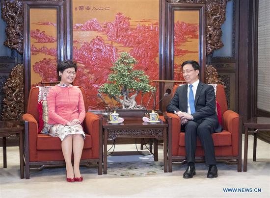 Chinese Vice Premier Han Zheng, also a member of the Standing Committee of the Political Bureau of the Communist Party of China (CPC) Central Committee, meets with Chief Executive of Hong Kong Special Administrative Region (HKSAR) Lam Cheng Yuet-ngor in Beijing, capital of China, June 26, 2018. (Xinhua/Wang Ye)