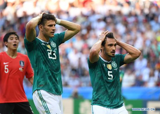 Mario Gomez (C) and Mats Hummels of Germany react during the 2018 FIFA World Cup Group F match between Germany and South Korea in Kazan, Russia, June 27, 2018. (Xinhua/Li Ga)